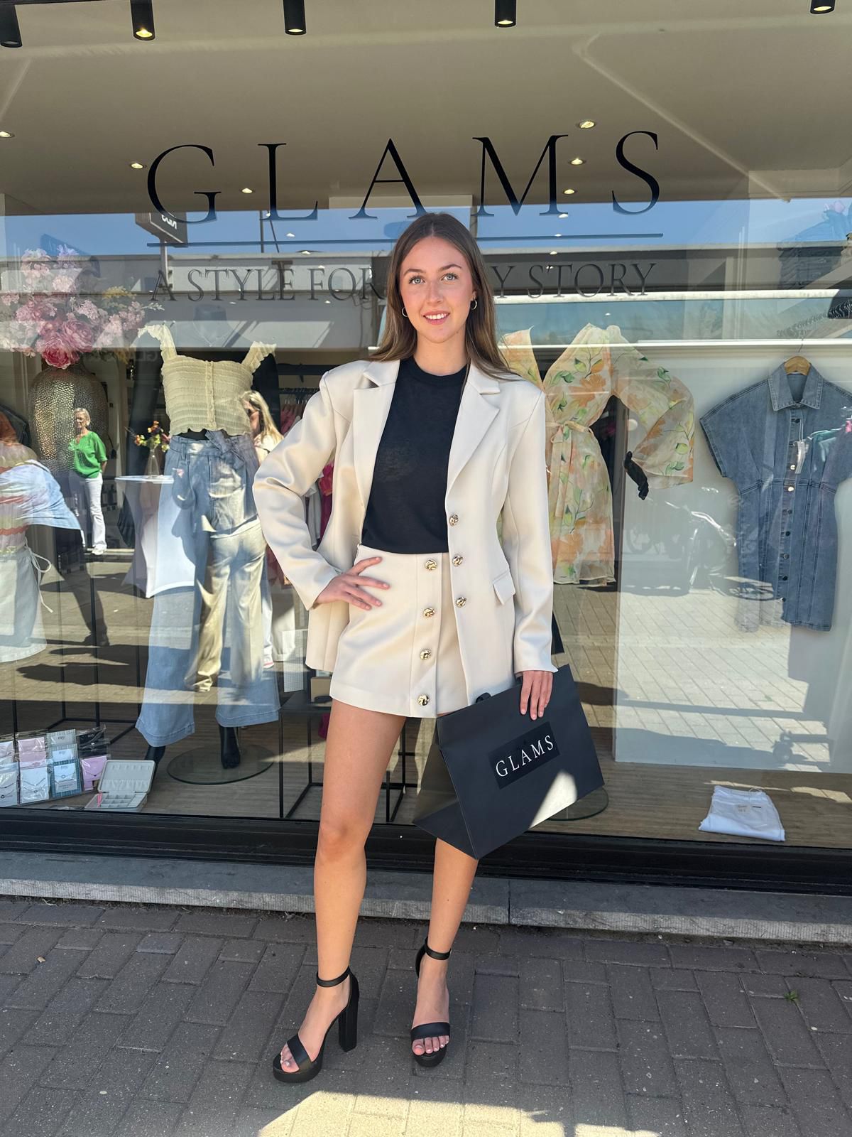 Blazer met gouden knopen